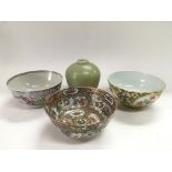 Three Oriental bowls with various typical decorati