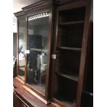 A Victorian mahogany break front bookcase fitted w