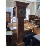 A Victorian pine cased longcase clock with brass d