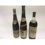 Three bottles of Vintage wineA bottle of 1949 S He