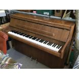 A Bentley upright piano.