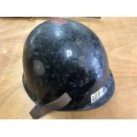 A WW2 helmet with liner