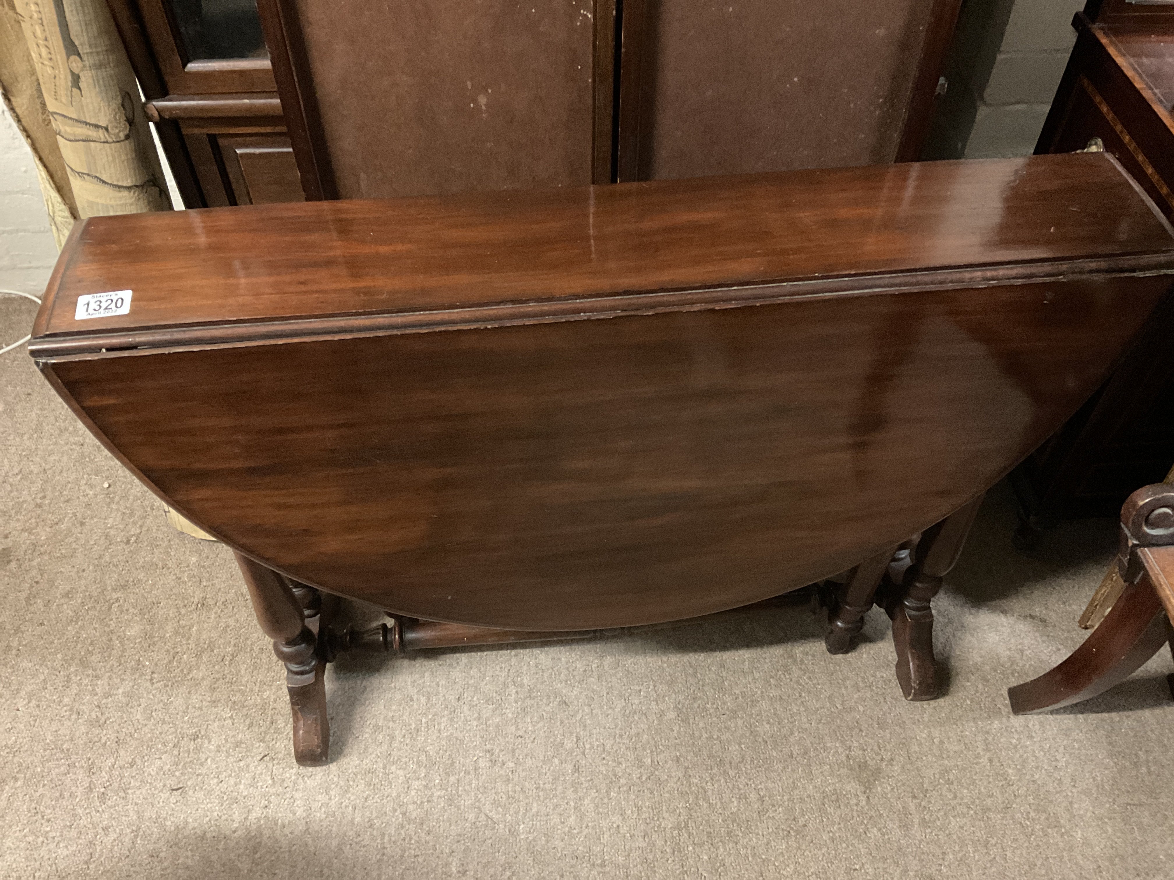 A Victorian mahogany Sutherland table. 90cm.