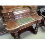 A Victorian mahogany table with compartments and a