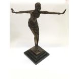 An Art Deco style bronze of a female dancer, appro