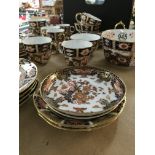 A collection of Royal crown Derby tea ware includi