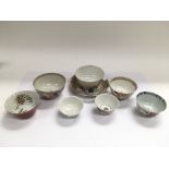 A collection of Oriental tea bowls.