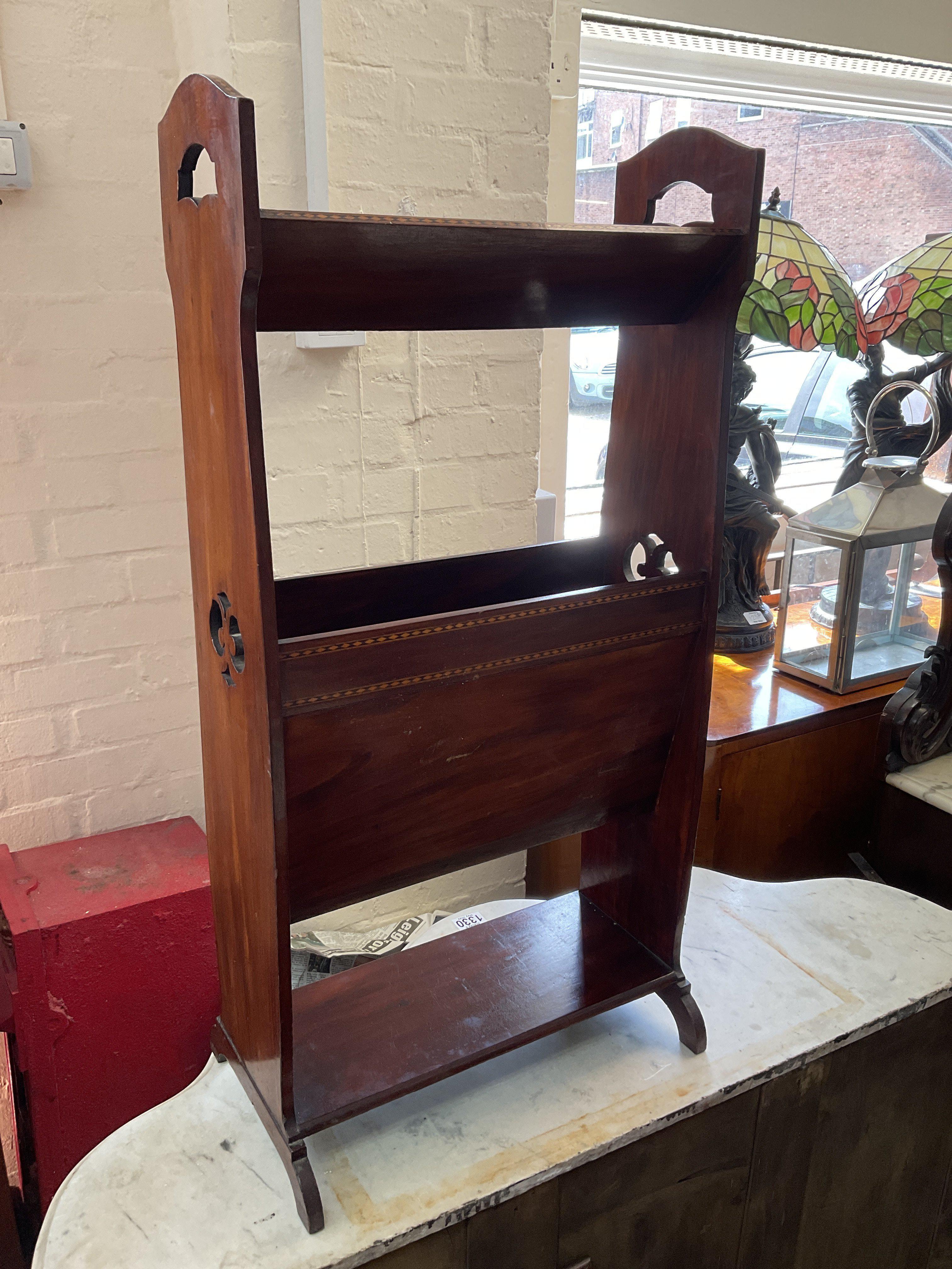 An Edwardian inlaid bookcase. 87cm.