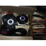 A large collection of 7 inch singles by various ar