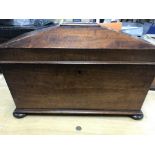 A Victorian mahogany tea caddy with inset glass li