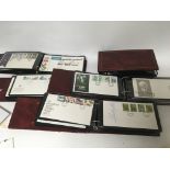 A collection of albums of first day covers and som