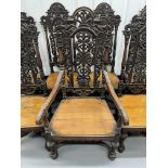 A set of 7 Victorian oak high back chairs, used by