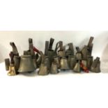 A collection of church hand bronze bells with lett