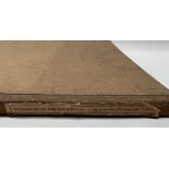 A canvas bound copy titled the descriptive catalog