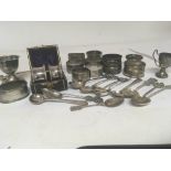 A collection of silver napkin rings Chinese silver spoons and other oddments (a lot)