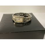 A ladies stone set Guess fashion watch with origin