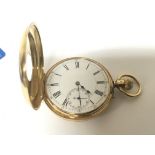 An 18carat gold half Hunter pocket watch button wi