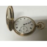 A 9carat gold cased Hunter pocket watch seen worki