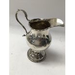 A Georgian silver cream jug 10 cm 111 grams.