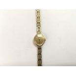 An Accurist 9ct gold ladies watch.