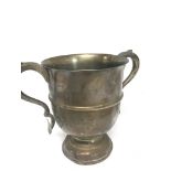 A silver trophy cup with shaped handles London hal