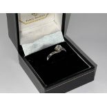 A platinum and approx 0.30ct diamond solitaire rin