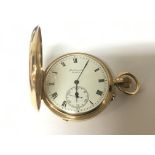 An 18carat gold cased half hunter pocket watch wit