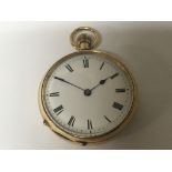 A small 18carat gold open face pocket watch button