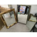 A collection of three mirrors including a gilt fra