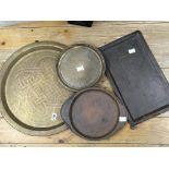 Four Eastern style brass and copper trays of Vario