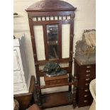 An Edwardian coat and stick stand with mirror and