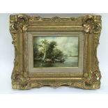 A gilt framed oil on board of a Dutch river scene