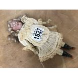 A German bisque headed doll with jointed composition body
