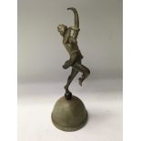 A Art Deco figure in the form of a dancing maiden