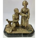 A bronze figure of a young lady and kneeling man o