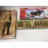 A box Containing Airfix kits and models Soldiers V