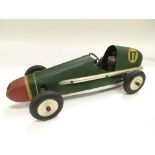 A scratch built tin plate racing car, approx lengt