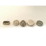 5 miniature continental silver boxes.