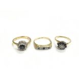 Three 18ct gold rings set with sapphires and diamo