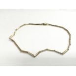 A 14k gold necklet, approx 11.5g.