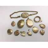 Twelve gold lockets and one chain, approx total we