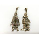 Two gold clown pendants set with multicoloured sto