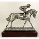 A Hallmarked silver model of a Jockey on horseback
