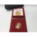 A gold 1980 proof half sovereign.