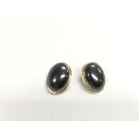 A pair of 14k gold hematite earrings, approx 10.7g