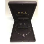 A boxed Asprey & Garrard designer jewellery suite