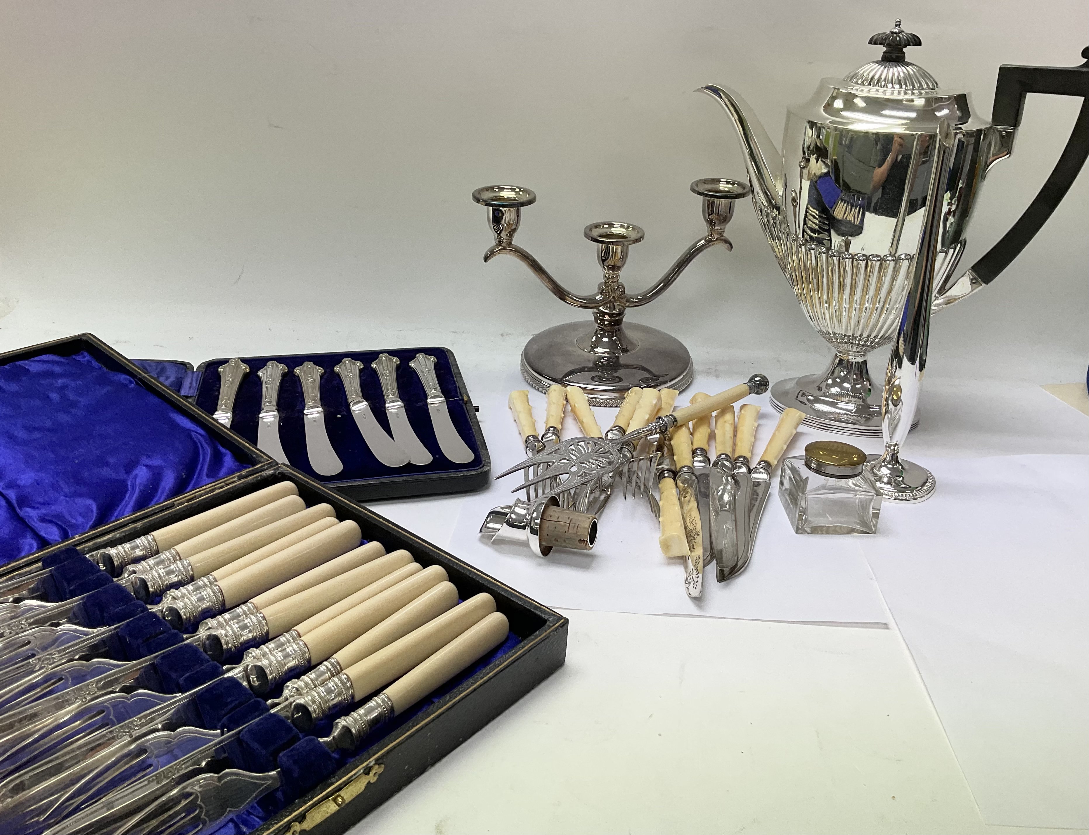 A collection of silver plated items.