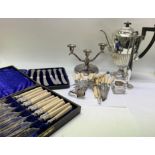 A collection of silver plated items.