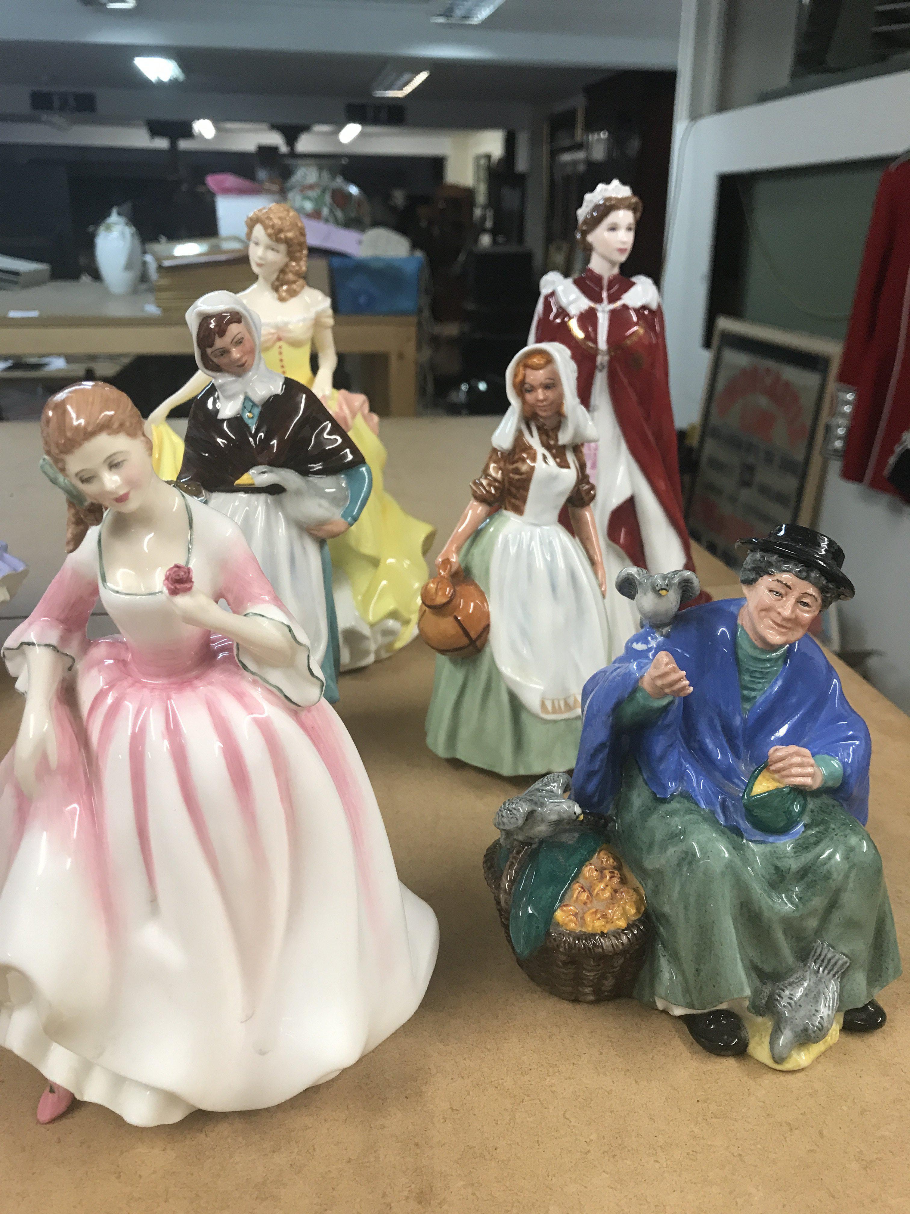 A Collection Of six Royal Doulton figures.