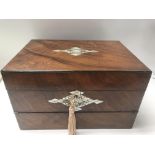 A Victorian walnut sewing/ writing box inlaid with